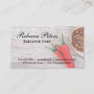 Chili Peppers and Flakes on Wooden Table Business Card