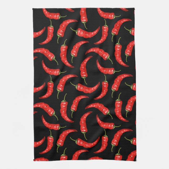 Chili peppers on black kitchen towel (Vertical)