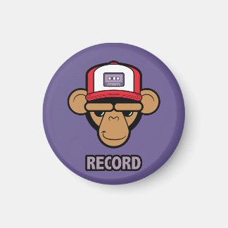 Chimp with a cassette tape on his hat magnet
