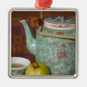 China, Hong Kong. Traditional Chinese teapot & 2 Metal Ornament