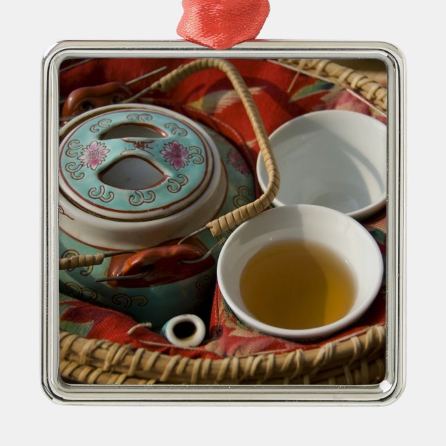 China, Hong Kong. Traditional Chinese teapot & 3 Metal Ornament (Front)