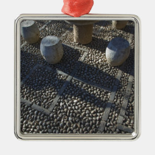 CHINA, Yunnan Province, Lijiang. Old Town, Stone Metal Ornament
