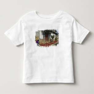 CHINA, Yunnan Province, Tianshengying. Drying Toddler T-shirt