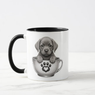 Chiot Labrador Retriever argenté en tasse de thé