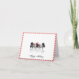 Chiots espagnols Cocker en Santa Hat Carte de Noël