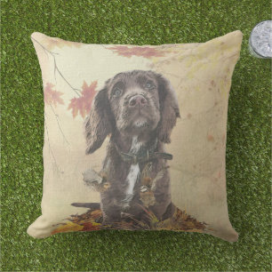 Chocolate cocker spaniel puppy outdoor pillow