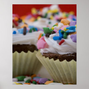 Chocolate cupcakes with icing and sprinkles, poster