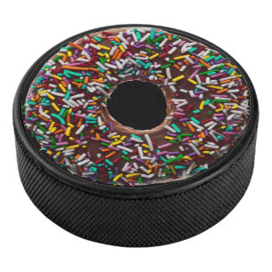 Chocolate donut with colorful sprinkles