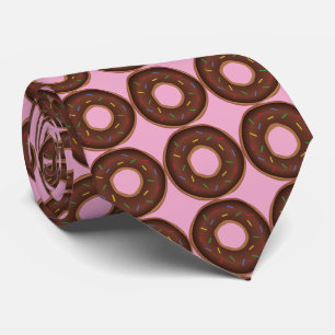 chocolate doughnuts. Pink background Tie