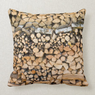 Chopped wood on a pile throw pillow