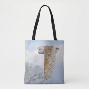 Chouette de l'étable en vol sur tout le sac d'imp