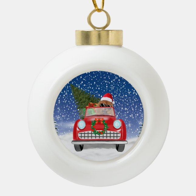 Chow Chow Dog Driving Car In Snow Ceramic Ball Christmas Ornament (Front)