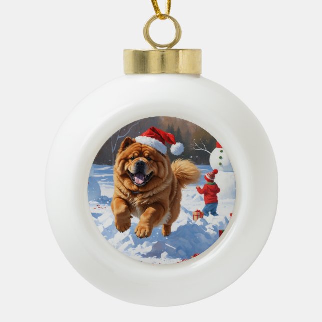 Chow Chow Running in Snow with Christmas Hat Ceramic Ball Christmas Ornament (Front)