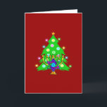 Christmas and Hanukkah Together Holiday Card<br><div class="desc">Christmas and Hanukkah on gifts for interfaith families that celebrate the joy of Christmas and beauty of Chanukah.  Featuring Xmas tree and menorah with jewish star of david surrounded by holiday presents on greeting cards,  postage,  gift ideas and apparel for the family.</div>