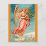 CHRISTMAS angel Postcard<br><div class="desc">TO WISH YOU A HAPPY CHRISTMAS angel carrying tree flies over snowy land,  village below right.</div>