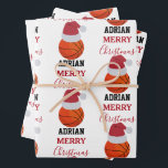 Christmas Basketball Sports Ball Custom Name Wrapping Paper Sheet<br><div class="desc">A cute illustration of basketball ball wearing a Santa hat with words "Merry Christmas" and your custom name. Perfect for adults and kids who love playing basketball. An ideal basketball themed Christmas wrapping paper for basketball players, basketball coaches, basketball teams, athletes and basketball enthusiasts. Simply customize the name and make...</div>