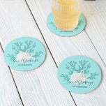 Christmas Beach Sand Dollar Starfish Aqua Blue Round Paper Coaster<br><div class="desc">This personalized beachy Christmas coaster is perfect for coastal holiday entertaining,  with aqua blue glitter coral,  white sand dollar and starfish,  and the holiday message “Seas & Greetings”,  on a light aqua blue background.</div>