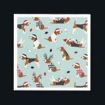 Christmas Beagles Blue Napkin<br><div class="desc">Cute beagles dressed in festive holiday outfits,  Santa hats and argyle sweaters with scattered Christmas ornaments on a blue background.</div>