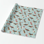 Christmas Beagles Blue Wrapping Paper<br><div class="desc">Cute beagles dressed in festive holiday outfits,  Santa hats and argyle sweaters with scattered Christmas ornaments on a blue background.</div>
