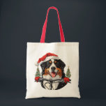 Christmas Bernese Mountain Dog Biking Tote Bag<br><div class="desc">Cute illustration of a Bernese Mountain dog dressed as Santa Clause riding a bike. Perfect for pet lovers and dog parents during the holiday season.</div>