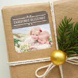 Christmas Blessings Rustic Wood Holiday Photo Square Sticker<br><div class="desc">Rustic style holiday stickers feature a white decorative frame for your custom text with space for a photo. Gray / brown weathered wood grain background.</div>