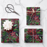 Christmas Burgundy Poinsettia Flowers Watercolor Wrapping Paper Sheet<br><div class="desc">This beautiful and artsy pattern is perfect for the Christmas holiday season. It features burgundy red, bright red, forest green, and faux gold hand-painted watercolor poinsettias, flowers, ivy leaves, and berries pattern on top of a dark navy blue background. It's modern, festive, unique, and elegant. Stylize with this hand-painted print...</div>
