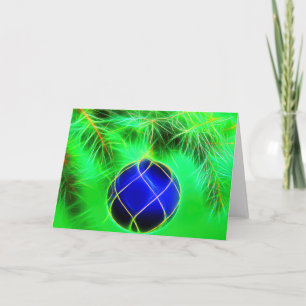 Christmas card blue bauble with fir branch