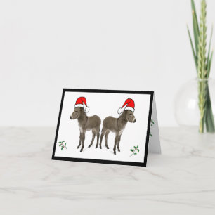 Christmas card with holly and donkey