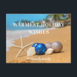 Christmas Coastal Beach Holiday Card<br><div class="desc">Christmas Coastal Beach Holiday Card - Christmas card features a gorgeous sandy beach with Christmas ornaments a starfish and seashells. Greeting reads Warm Holiday Wishes and is personalized with your family name and year. The back of the postcard features a greeting. All text is editable.Card is part of a collection....</div>
