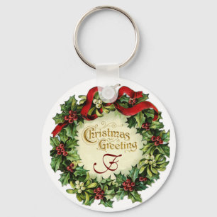 CHRISTMAS CROWN WITH MISTLETOES AND HOLLY BERRIES KEYCHAIN
