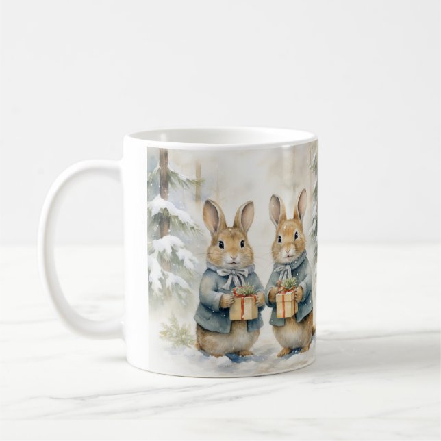 Christmas cup illustrated with cute rabbits. (Left)