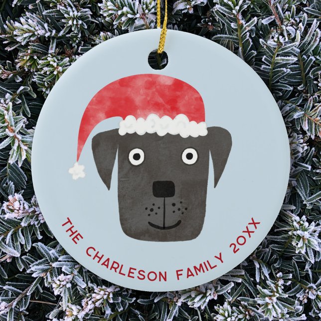 Christmas Dog Family Name Date Ceramic Ornament (Black labrador retriever dog in a Santa hat personalized family name date ceramic Christmas ornament)