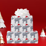 Christmas Elephant Santa Cute Wrapping Paper<br><div class="desc">Cute holiday animals are my favourite part of Christmas. A pretty elephant wearing a red Santa hat and looking happy. This fills me with the Christmas spirit. Personalize this present with the gift recipient's name for a beautiful customized Christmas gift.</div>