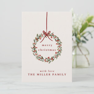 Christmas foliage wreath with red bow  holiday card