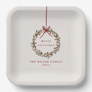 Christmas foliage wreath with red bow paper plate