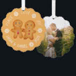 Christmas Gingerbread Couple Photo Snowflakes Cute Ornament Card<br><div class="desc">A Christmas design: a pair of cute little gingerbread figurines -a gingerbread man and woman - holding hands, on light brown background, surrounded by arched text with white snowflakes between words. The message above is Peace Love Joy, below there is the names and year. On the back there is a...</div>