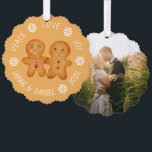 Christmas Gingerbread Couple Photo Snowflakes Cute Ornament Card<br><div class="desc">A Christmas design: a pair of cute little gingerbread figurines -a gingerbread man and woman - holding hands, on light brown background, surrounded by arched text with white snowflakes between words. The message above is Peace Love Joy, below there is the names and year. On the back there is a...</div>