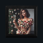 Christmas Glamour Gift Box<br><div class="desc">A stunning brunette woman exudes holiday cheer in a unique,  eye-catching dress adorned with shimmering gold fabric and a cascade of colourful Christmas ornaments. Holding a champagne flute with a delicate hand,  she stands confidently before a brightly lit Christmas tree,  her captivating gaze meeting the viewer's eye.</div>