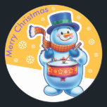 Christmas gold round sticker Snowman drummer.<br><div class="desc">Christmas gold round sticker Snowman drummer. and other Snowfolk. Winter Wonderland snowmen. Lovable wintery snowmen and snowgirl characters playing their instruments in a Christmas band. Also check out the matching lovable wintery characters with skating penguins, sledging snowgirls, skiing snowmen and skating snowmen : ) A lovely illustrated original sticker to...</div>