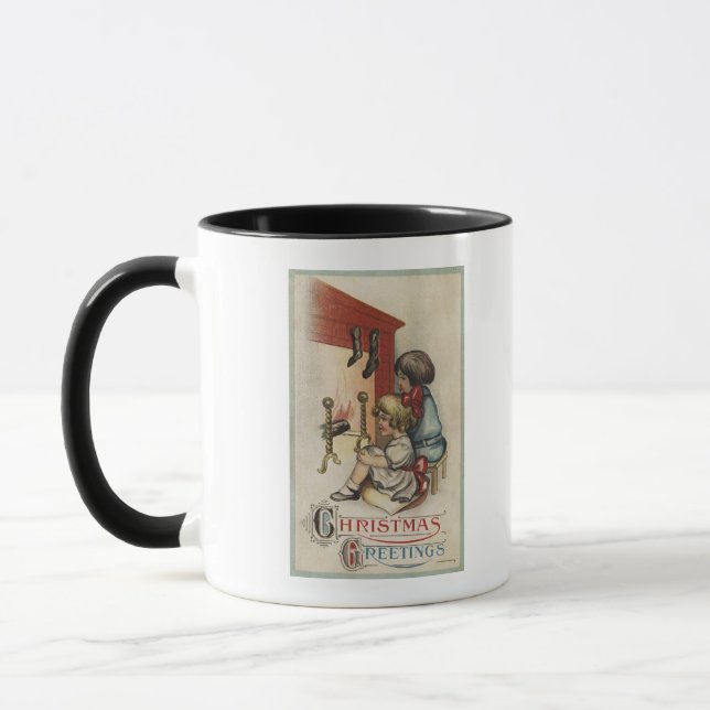 Christmas GreetingLittle Girls by Fireplace Mug (Left)