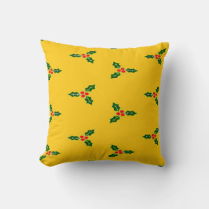 Christmas holly on orange throw pillow