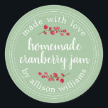 Christmas Homemade Cranberry Jam Canning Classic Round Sticker<br><div class="desc">Rustic and modern homemade Christmas jam canning cranberry jam jar sticker with the text made with love, homemade cranberry jam and your name in white chic script calligraphy and modern typography on a quiet green background with a stylish touch of cranberries. Simply add your name and the product name to...</div>