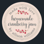 Christmas Homemade Cranberry Jam Canning Pink Classic Round Sticker<br><div class="desc">Rustic and modern homemade Christmas jam canning cranberry jam jar sticker with the text made with love, homemade cranberry jam and your name in off-black chic script calligraphy and modern typography on a peach dust pastel pink background with a stylish touch of cranberries. Simply add your name and the product...</div>