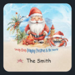 Christmas in July at the beach  Square Sticker<br><div class="desc">Experience the magic of Christmas in the middle of summer at the beautiful beach Square Sticker! Embrace the joy and excitement of the holiday season, even when the weather is warm and sunny. Celebrate Christmas in July with your loved ones and create unforgettable memories by the seaside. Spread the festive...</div>