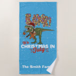 Christmas in July Dinosaur Funny Personalized Beach Towel<br><div class="desc">A personalized family Christmas in July design that you can put your own family last name or custom text on to make it unique! Great for a Christmas in July summer party, BBQ, or pool party, this design features a T-Rex dinosaur chomping down on a gingerbread man cookie with the...</div>