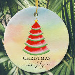Christmas in July Watermelon Ceramic Ornament<br><div class="desc">These fun Christmas in July ornament is decorated with a red watercolor watermelon Christmas tree on a colourful background.
Because we create our artwork you won't find this exact image from other designers.
Original Watercolor © Michele Davies.</div>