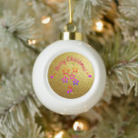 Christmas in Music Ceramic Ball Christmas Ornament<br><div class="desc">This sparkling Christmas ornament brings a joyful and festive touch to your tree. Its glittery gold surface highlights the Merry Christmas message, surrounded by colorful stars and musical notes that capture the magic of the holiday season. Hanging from a branch, it adds warmth, charm, and a musical glow to your...</div>