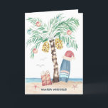 Christmas Island Palm Surf Santa Tropical Beach  Holiday Card<br><div class="desc">Beach theme Christmas card features a palm tree Christmas tree (decorated with ornaments and lights) on a tropical island with a Santa hat perched on a surfboard, a present, starfish, ocean waves, sea birds and a "Warm Wishes" holiday greeting. The greeting and name inside can be personalized. Art by KL...</div>