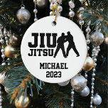 Christmas Jiu Jitsu Personalized  Ceramic Ornament<br><div class="desc">This design was created though digital art. It may be personalized in the area provided or customizing by changing the photo or added your own words. Contact me at colorflowcreations@gmail.com if you with to have this design on another product. See more of my creations or follow me at www.facebook.com/colorflowcreations, www.instagram.com/colorflowcreations,...</div>