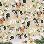 Christmas Joy Snowflake Photo Collage Pale Gold Wrapping Paper<br><div class="desc">'Wishing you joy' fun and stylish gift wrap! An editable template, personalized with six photos of your family, friends or pets. You can also include the recipient's name, your family name or the holiday year. A seamless pattern with snowball framed photographs, festive leaves, berries, snow, snowflakes and stars. Custom gift...</div>